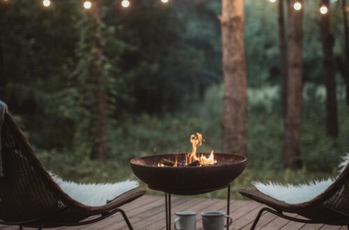 Cozy Outdoor Seating with Fire pit and string lights