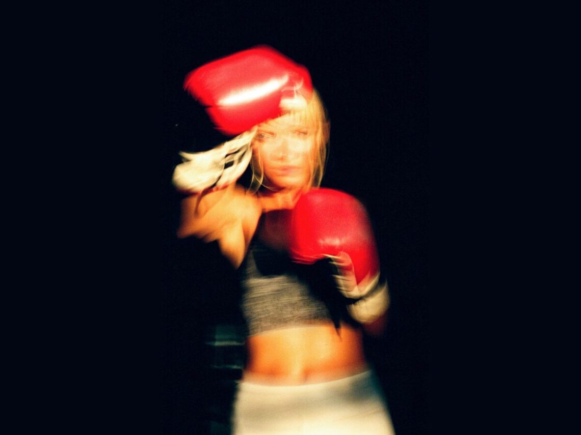 Woman Intently Focused boxing